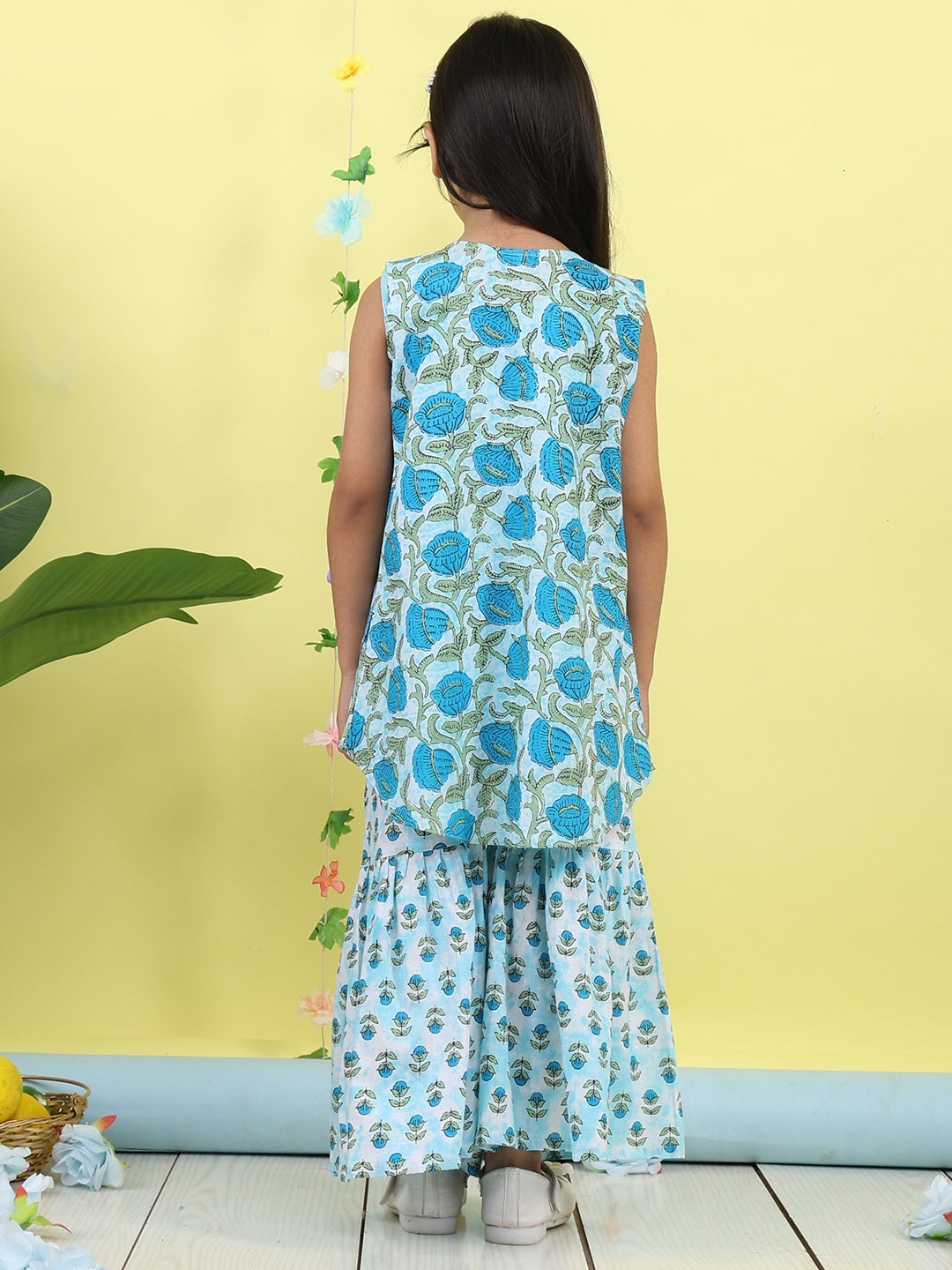 Blue stripped sleeveless kurti with Floral sharara and jacket