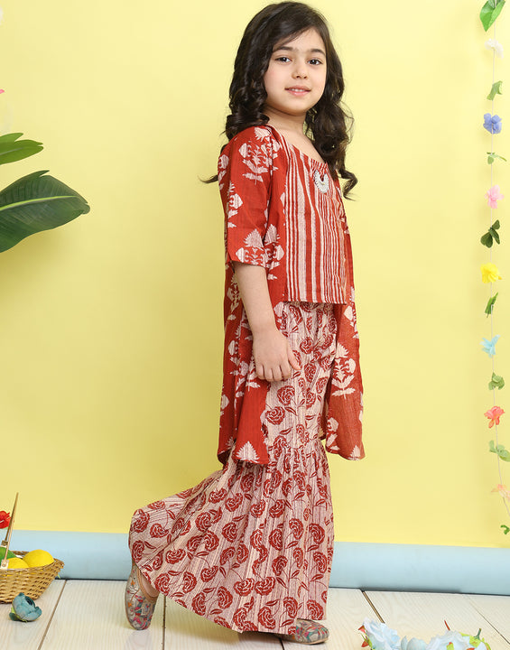 Red stripped sleeveless top with Floral sharara and jacket