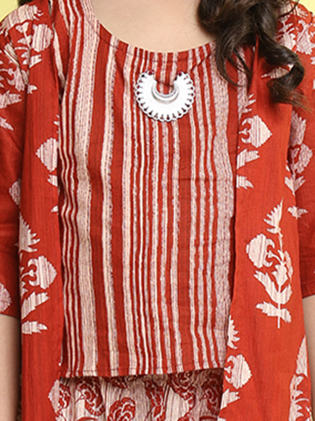 Red stripped sleeveless top with Floral sharara and jacket