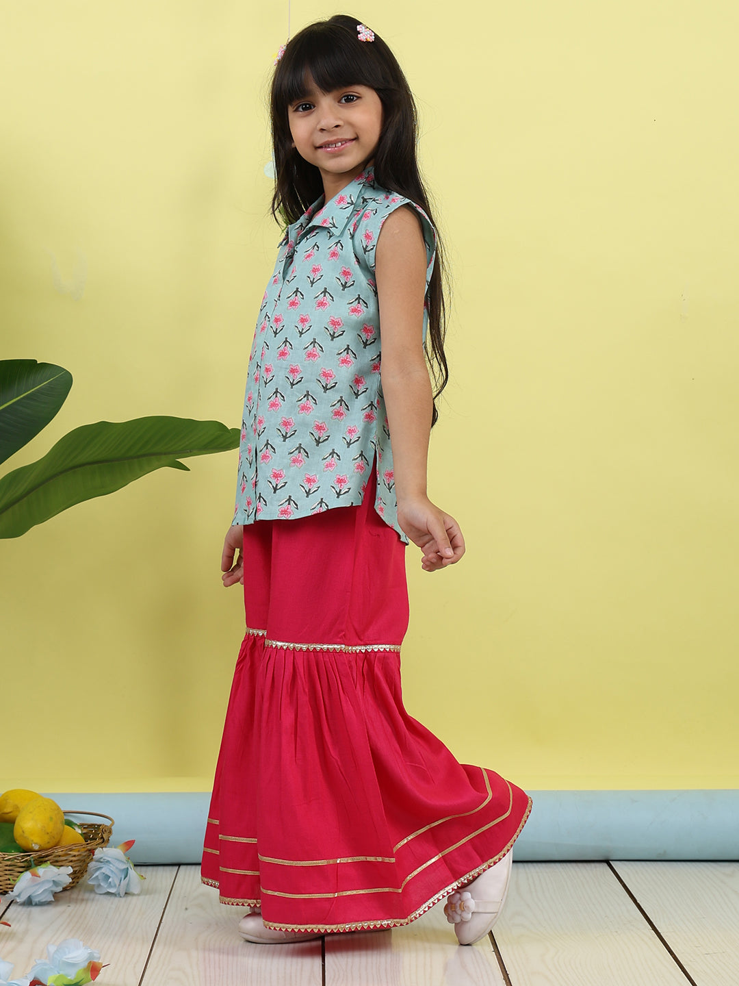 Green sleeveless collar kurti with pink Sharara