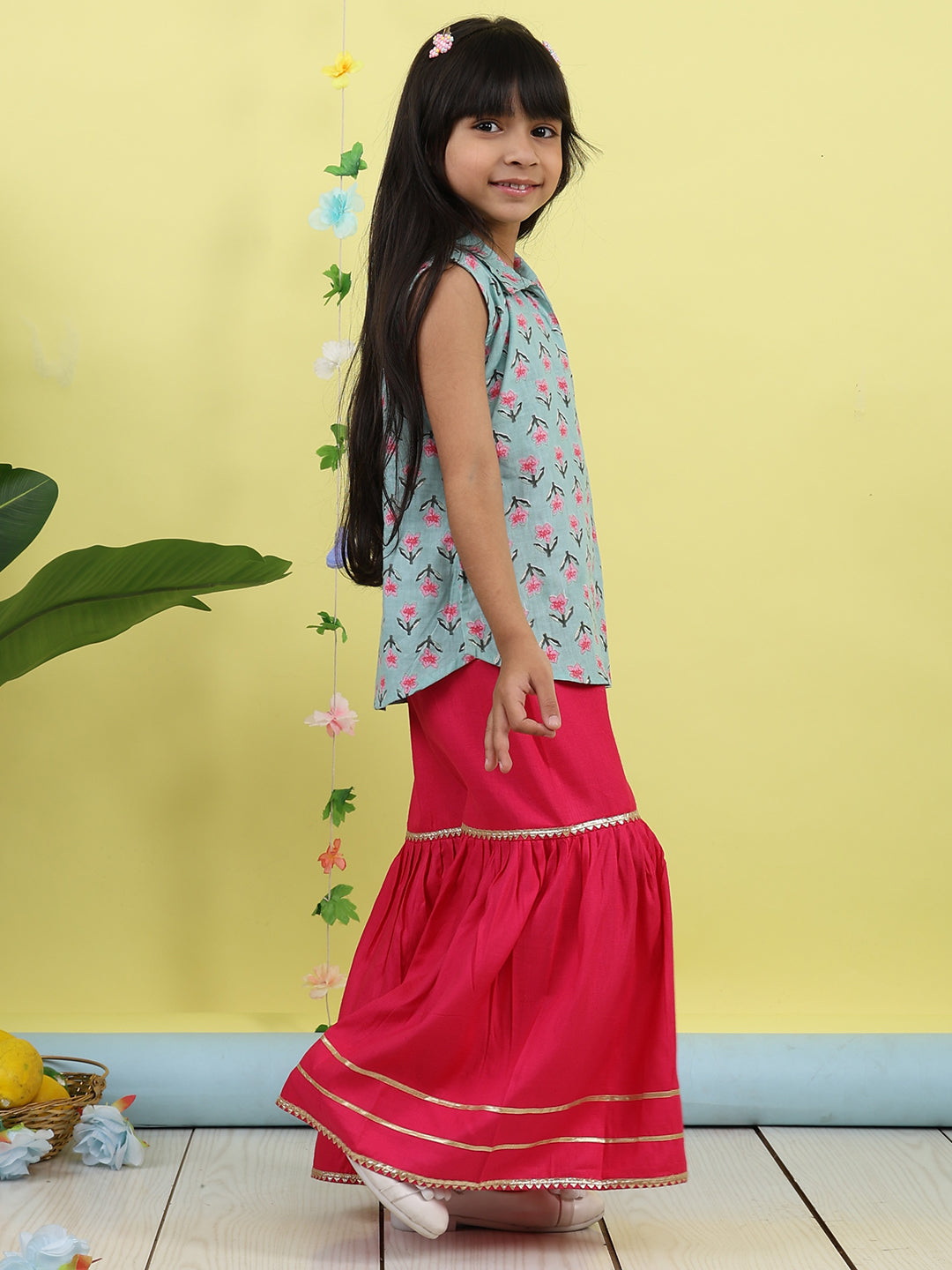 Green sleeveless collar kurti with pink Sharara