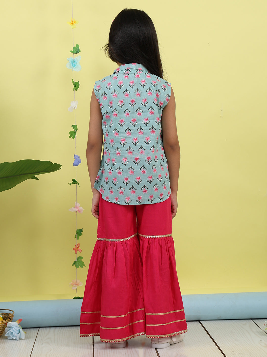 Green sleeveless collar kurti with pink Sharara