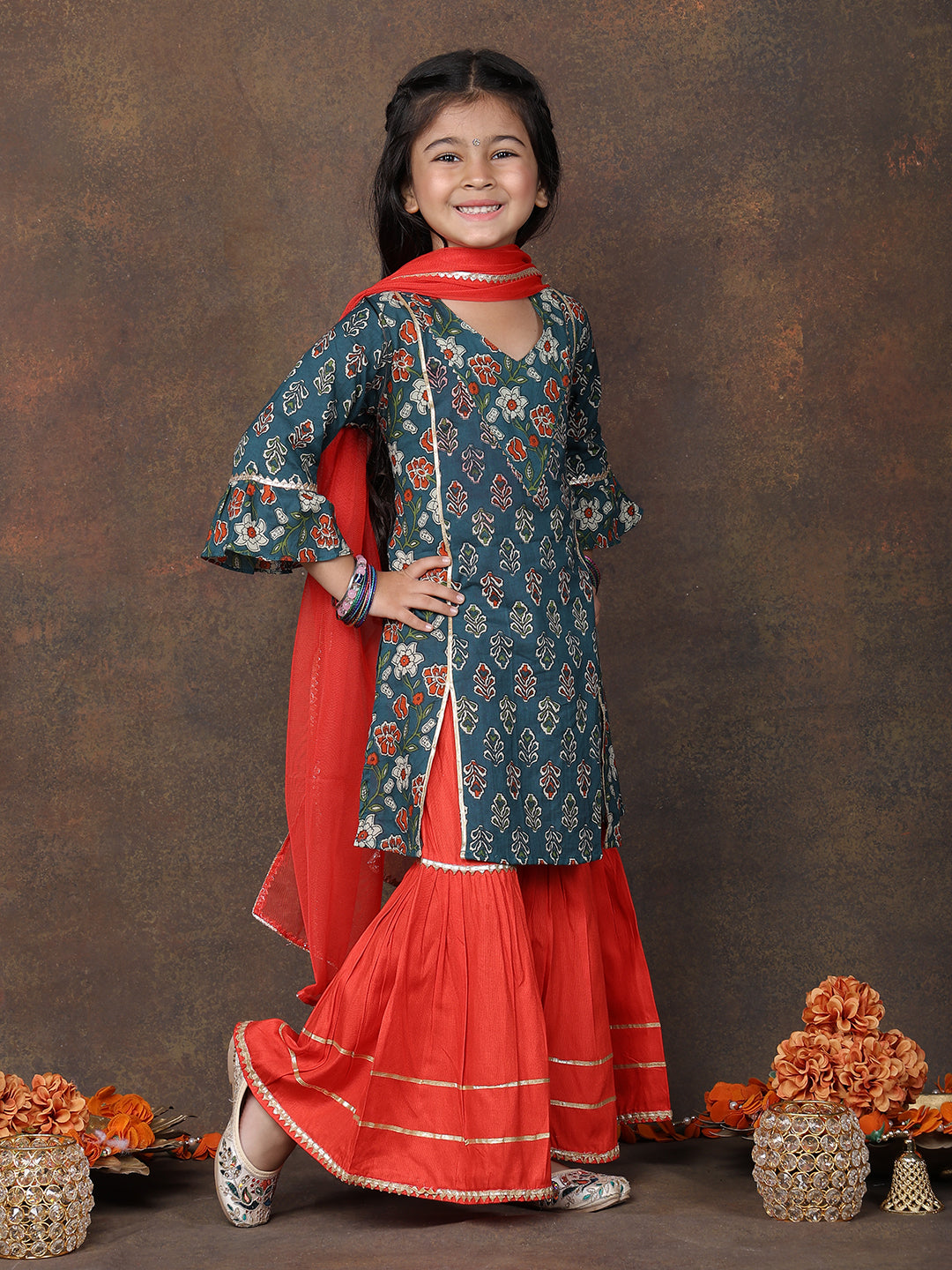 Blue 3/4 sleeves printed Kurti with Red sharara pant and dupatta