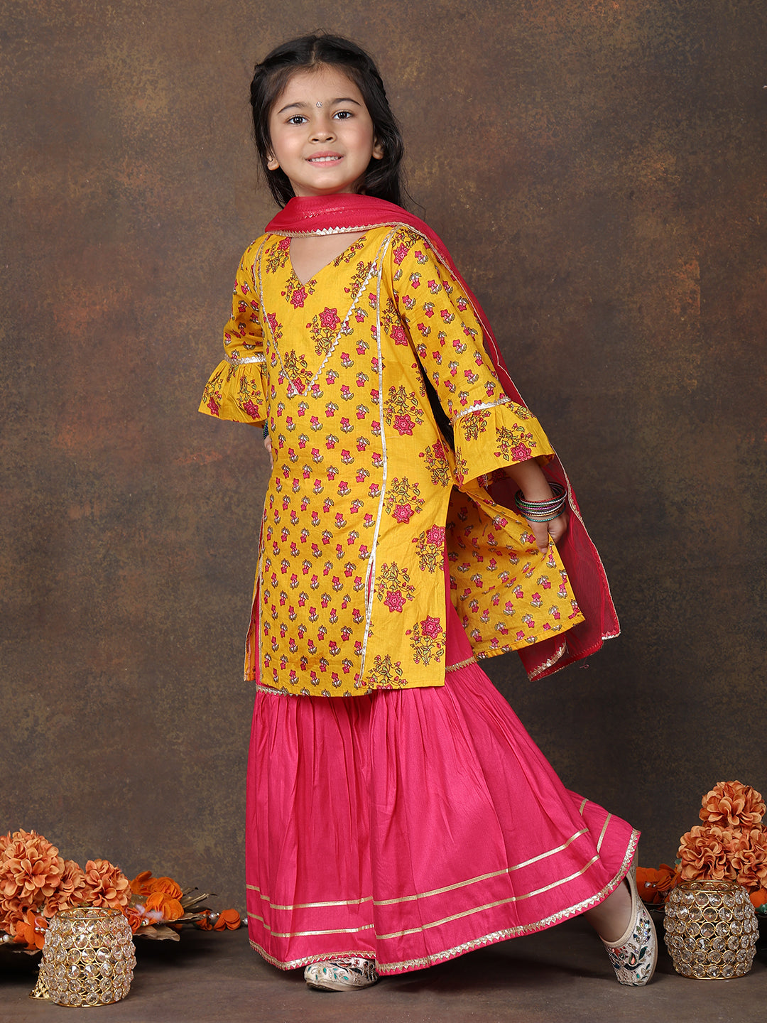 Yellow 3/4 sleeves printed Kurti with Pink sharara pant and dupatta