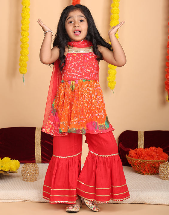 Red bandez printed Crushed sleeveless kurti with red sharara and dupatta