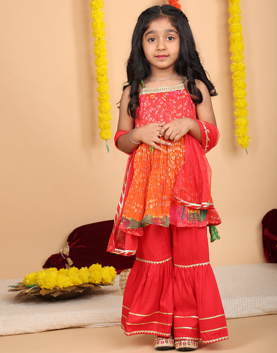 Red bandez printed Crushed sleeveless kurti with red sharara and dupatta