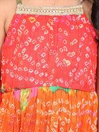 Red bandez printed Crushed sleeveless kurti with red sharara and dupatta