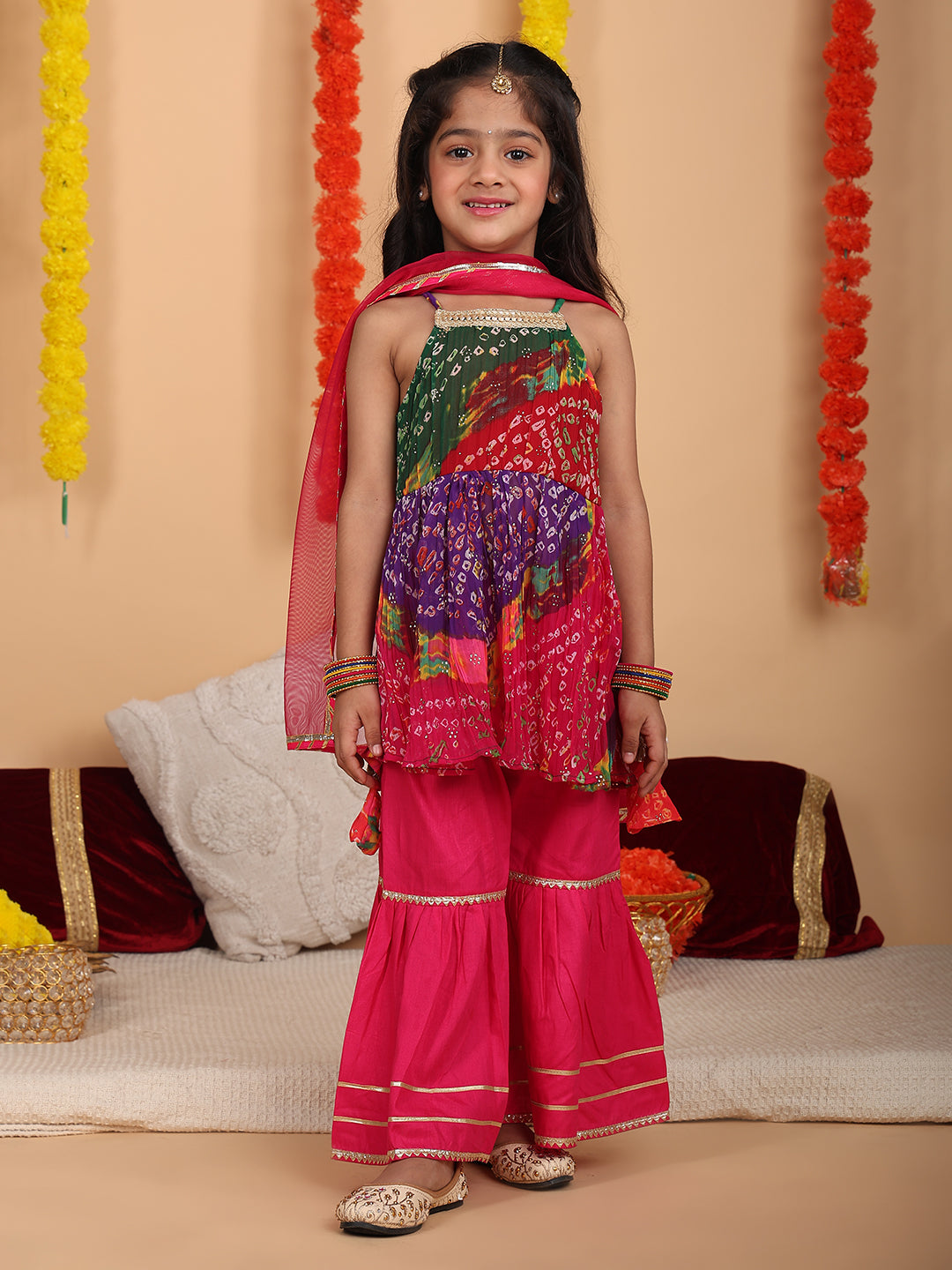 Pink bandez printed Crushed sleeveless kurti with Pink sharara and dupatta