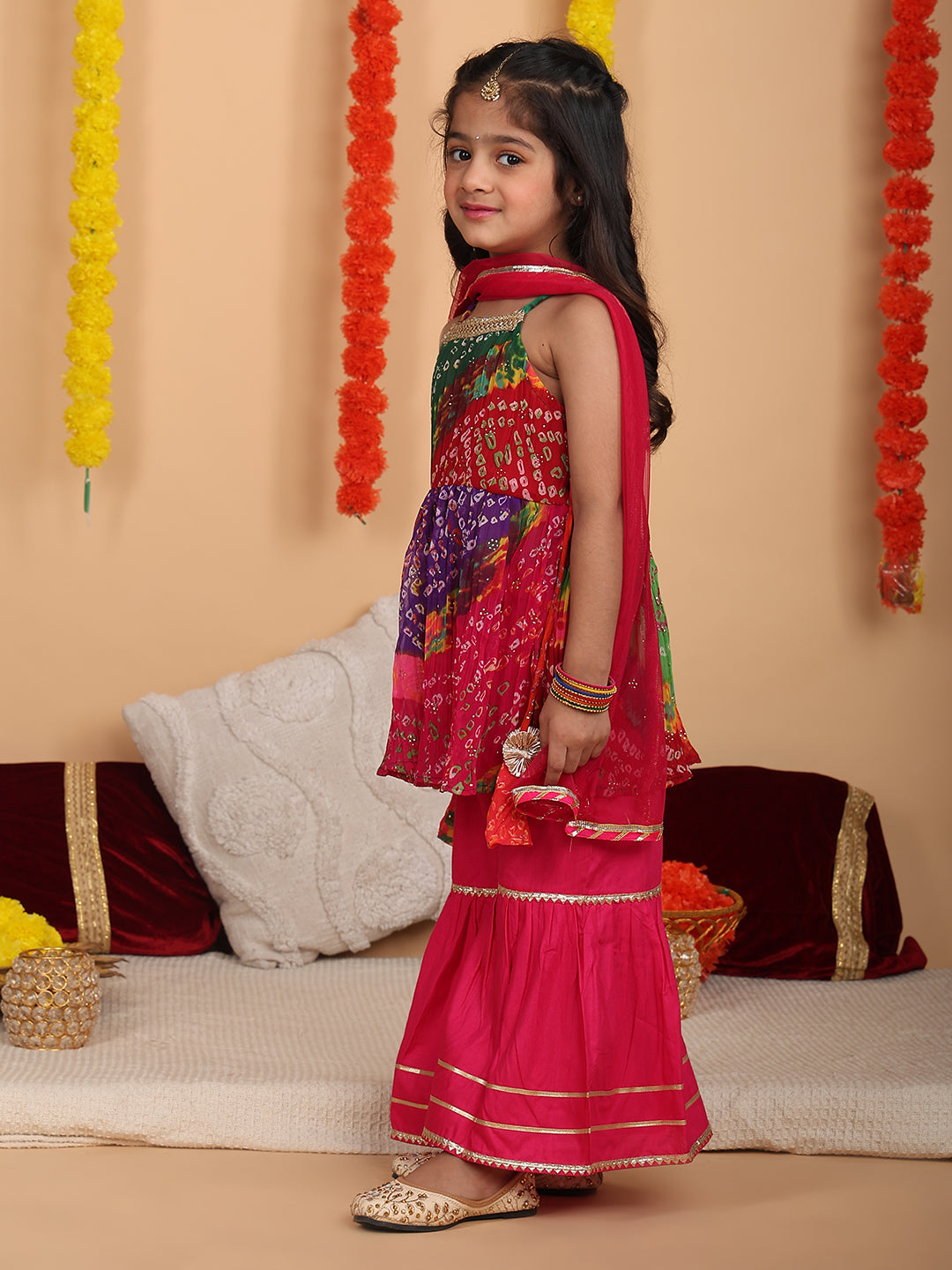 Pink bandez printed Crushed sleeveless kurti with Pink sharara and dupatta