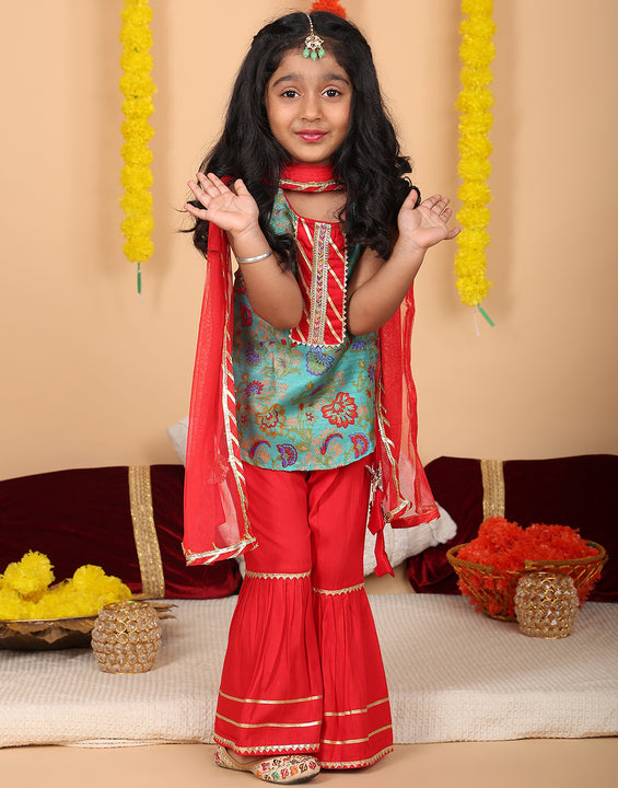 Green printed sleeveless kurti with Red sharara and dupatta
