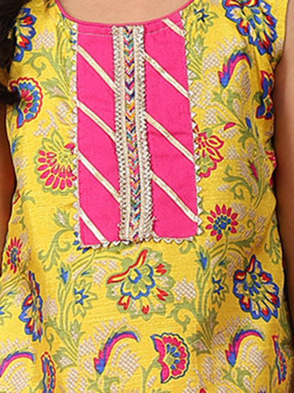 Yellow printed sleeveless kurti with Pink sharara and dupatta