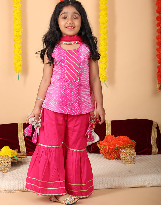 Pink sleeveless kurti with Pink sharara and dupatta