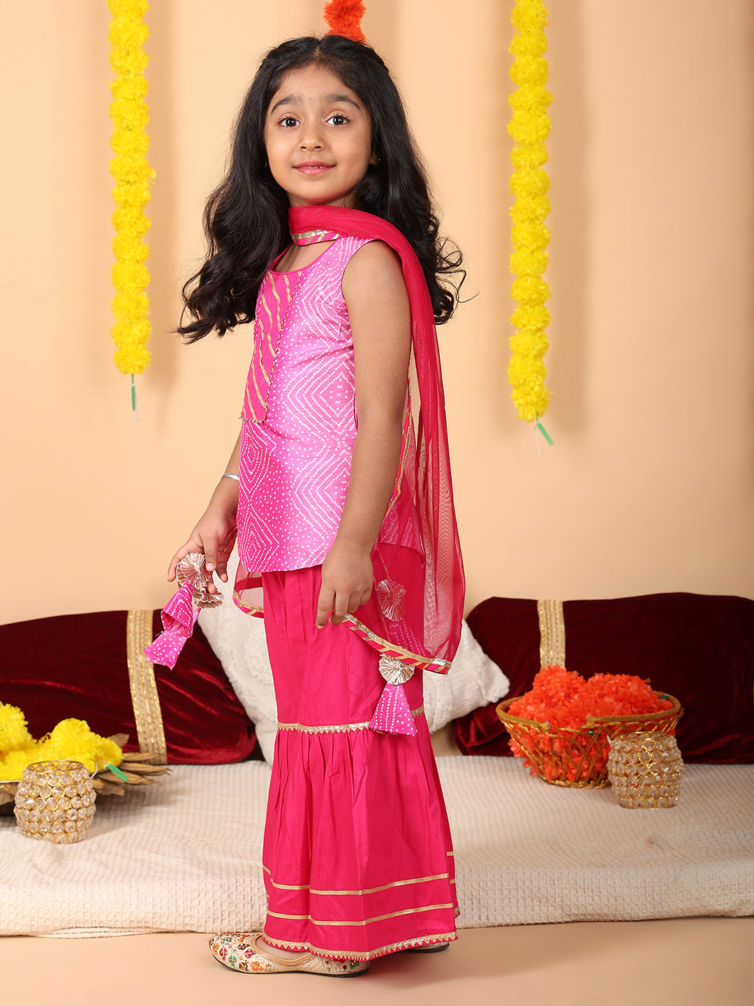 Pink sleeveless kurti with Pink sharara and dupatta