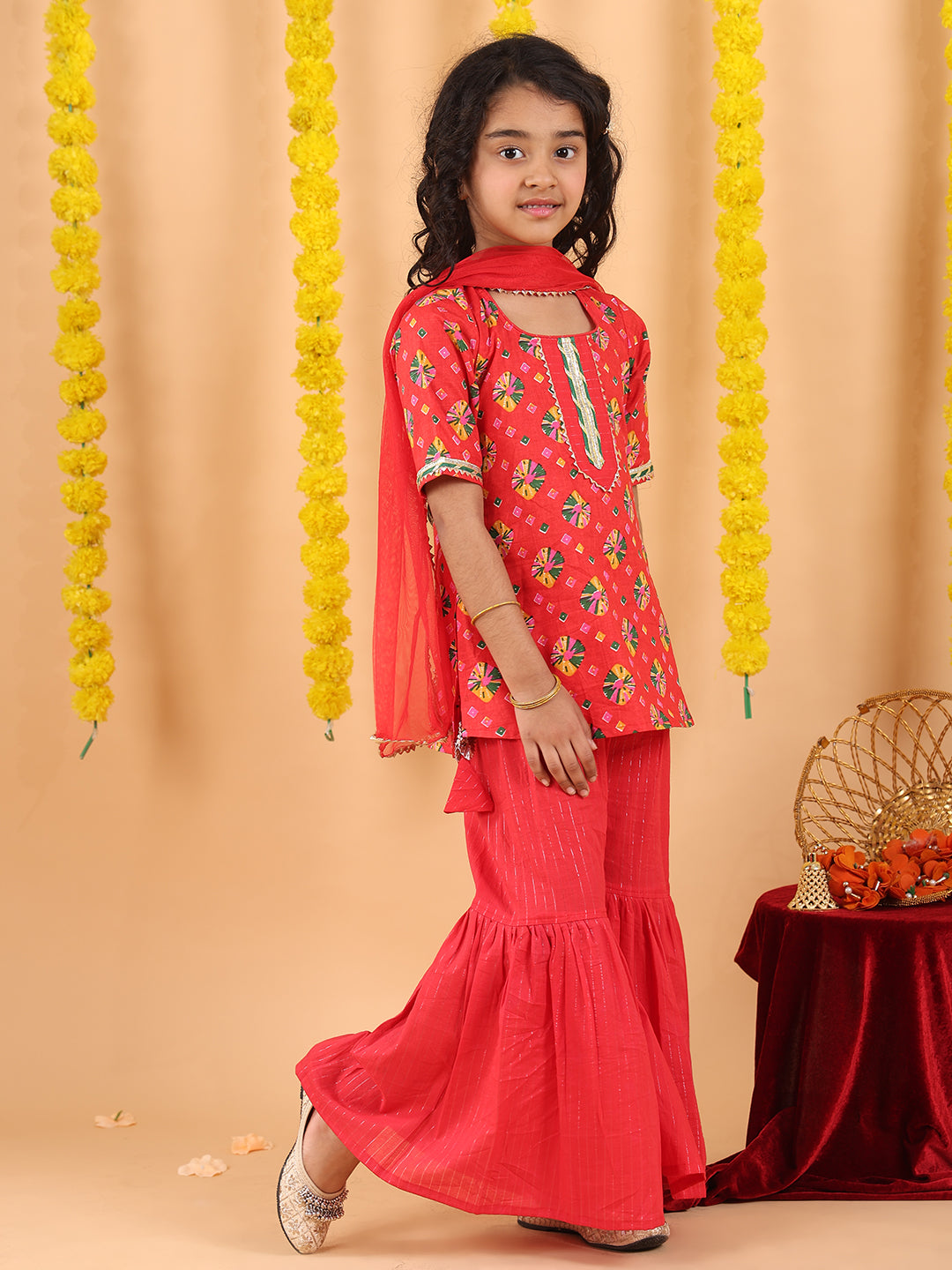 Red 3/4 sleeves printed Kurti with red Sharara pant and dupatta