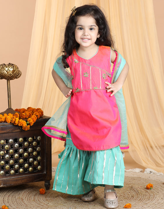 Pink embroidered Kurti paried with gold printed Sharara pant