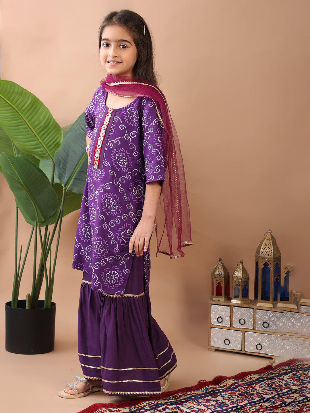 Purple kurti  paired with sharara and dupatta