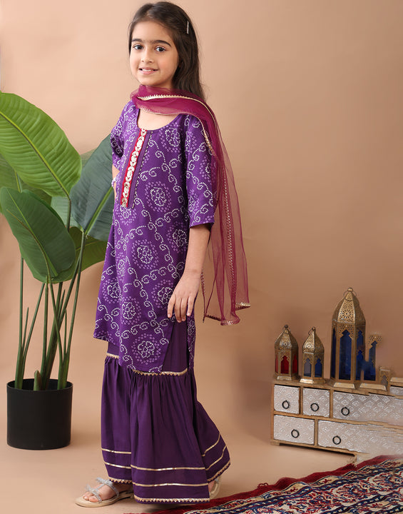 Purple kurti  paired with sharara and dupatta