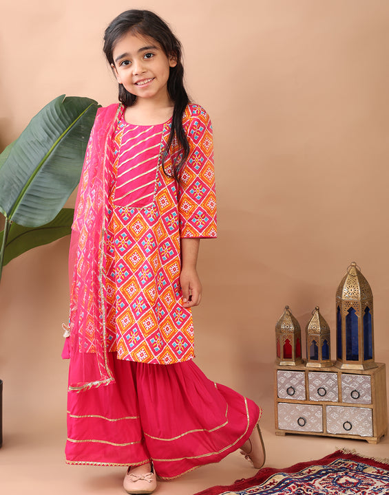 Red  Kurti  paired with pink sharara pant and dupatta