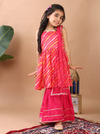 Pink Lehriya printed sleeveless Kurti  paired with pink sharara pant and dupatta