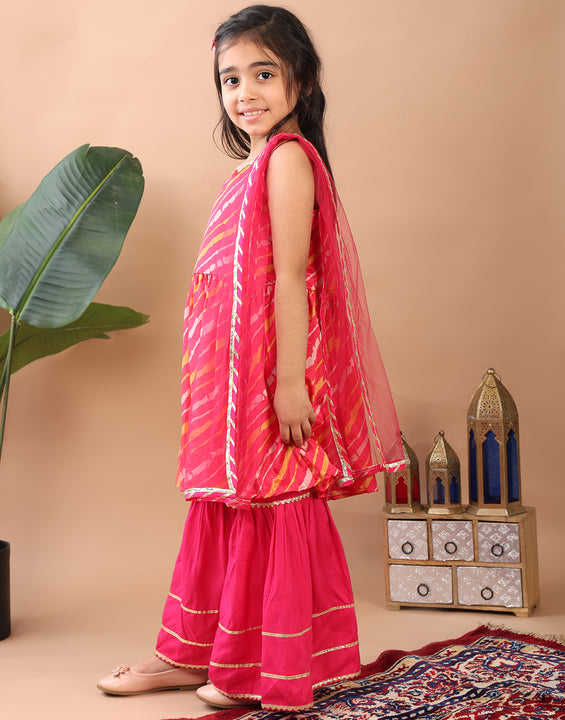 Pink Lehriya printed sleeveless Kurti  paired with pink sharara pant and dupatta
