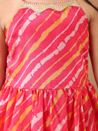 Pink Lehriya printed sleeveless Kurti  paired with pink sharara pant and dupatta