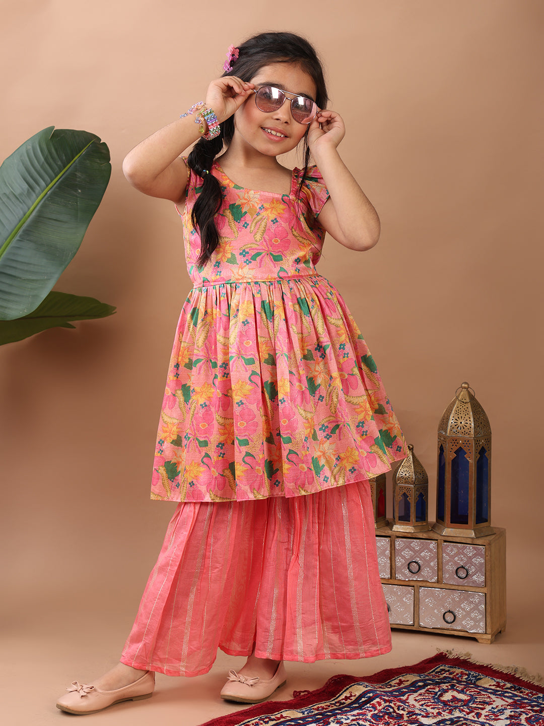 Pink Floral  printed sleeveless Kurti  paired with pink Lurex sharara pant and dupatta