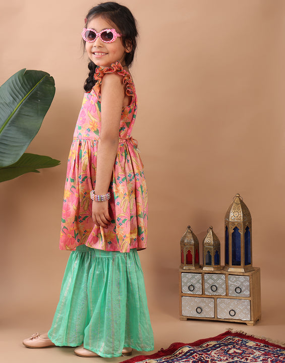 Pink Floral  printed sleeveless Kurti  paired with Green lurex sharara pant and dupatta