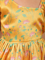 Yellow Lotus printed sleeveless Kurti  paired with pink Lurex sharara pant and dupatta