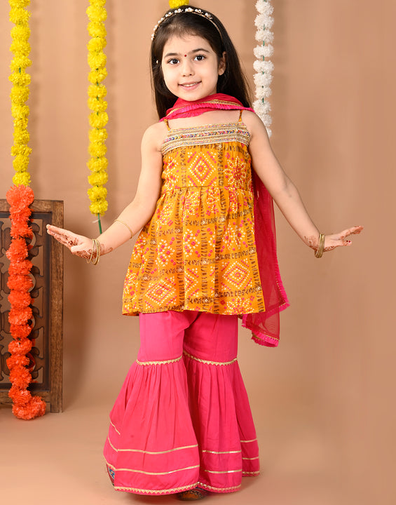 Yellow sleeveless muslin kurti with  Sharara and dupatta