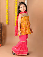 Yellow sleeveless muslin kurti with  Sharara and dupatta