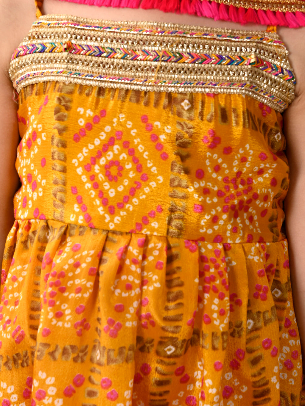 Yellow sleeveless muslin kurti with  Sharara and dupatta