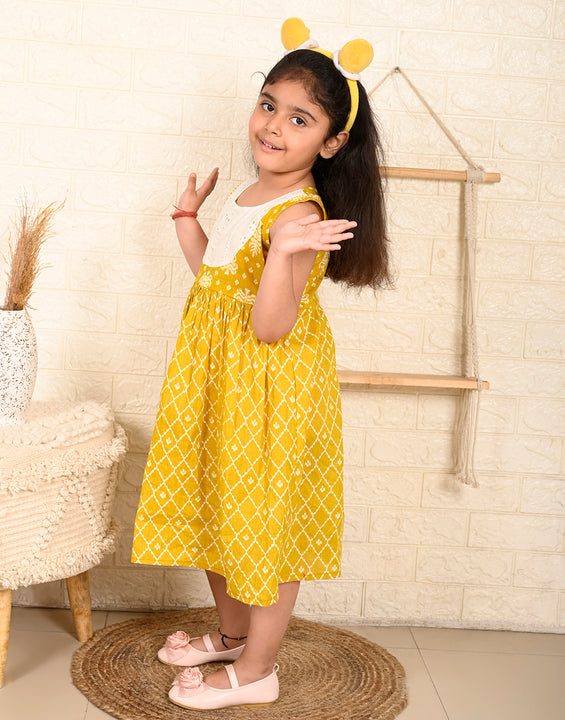 Yellow Sleeveless Dress with white patchwork at neck