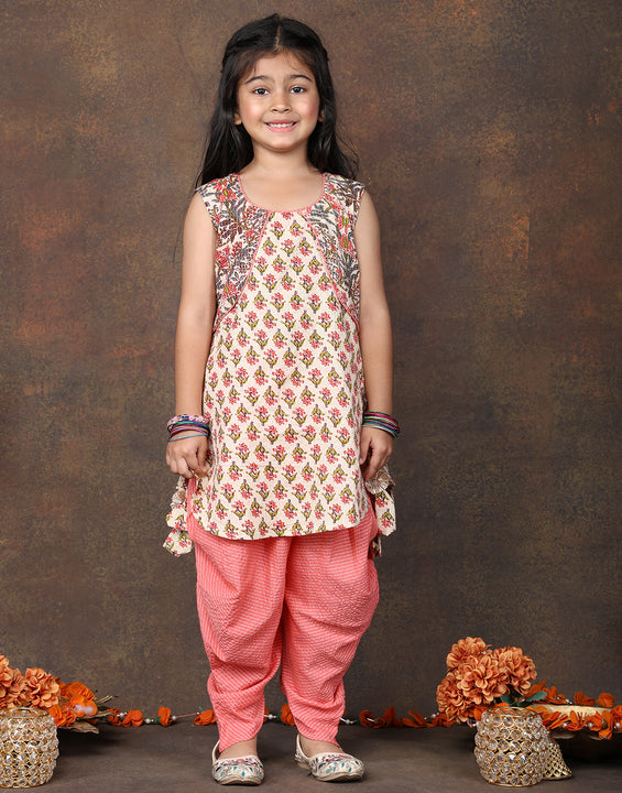 Peach Floral Printed sleeveless Kurti  paired with peach Dhoti