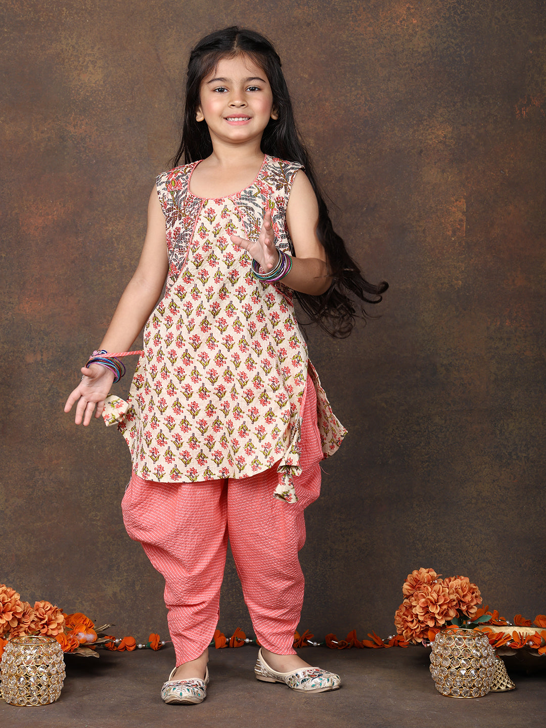 Peach Floral Printed sleeveless Kurti  paired with peach Dhoti