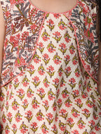 Peach Floral Printed sleeveless Kurti  paired with peach Dhoti
