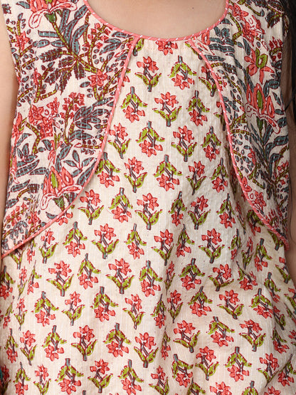 Peach Floral Printed sleeveless Kurti  paired with peach Dhoti