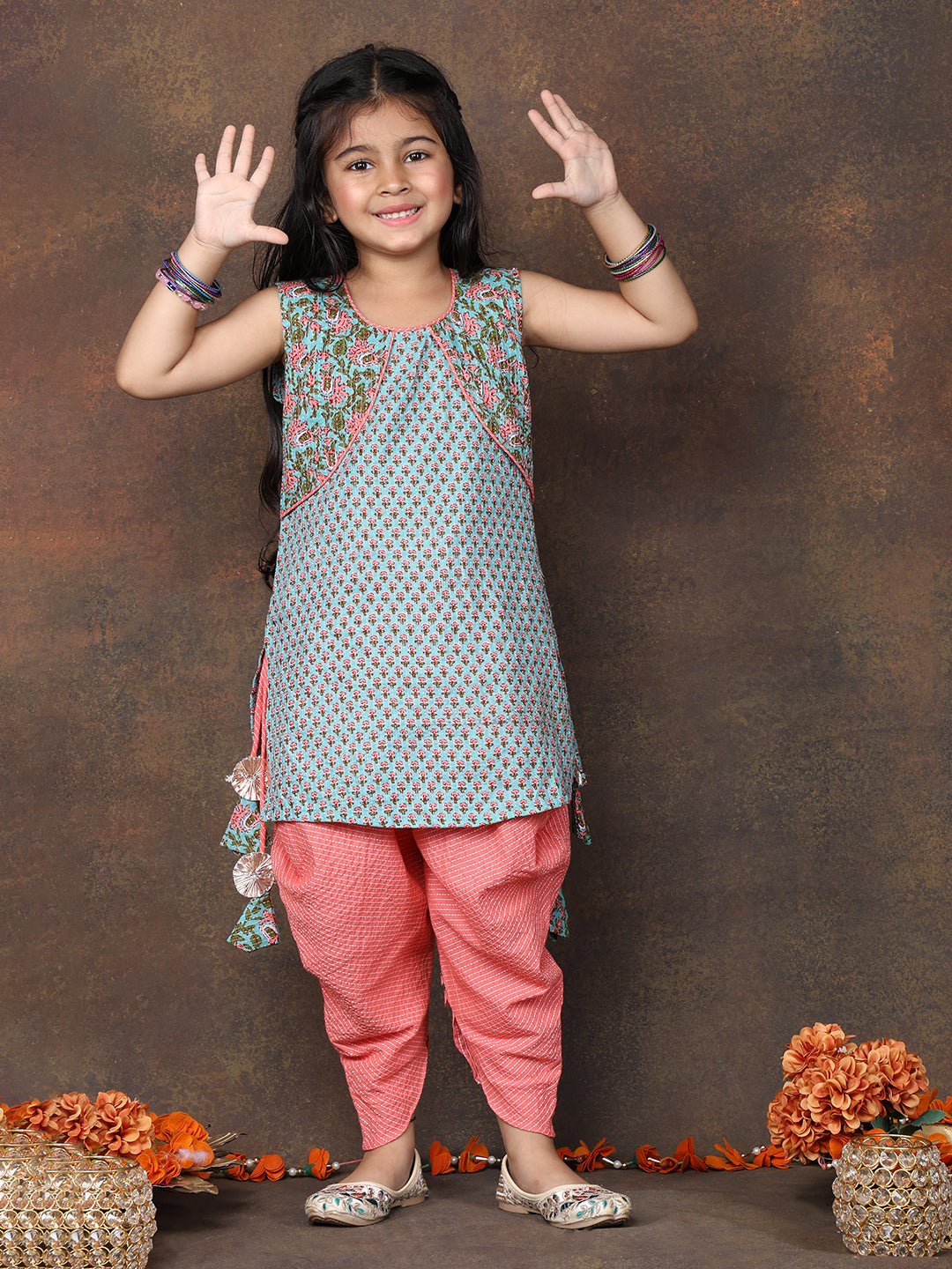 Blue Floral Printed sleeveless Kurti  paired with peach Dhoti