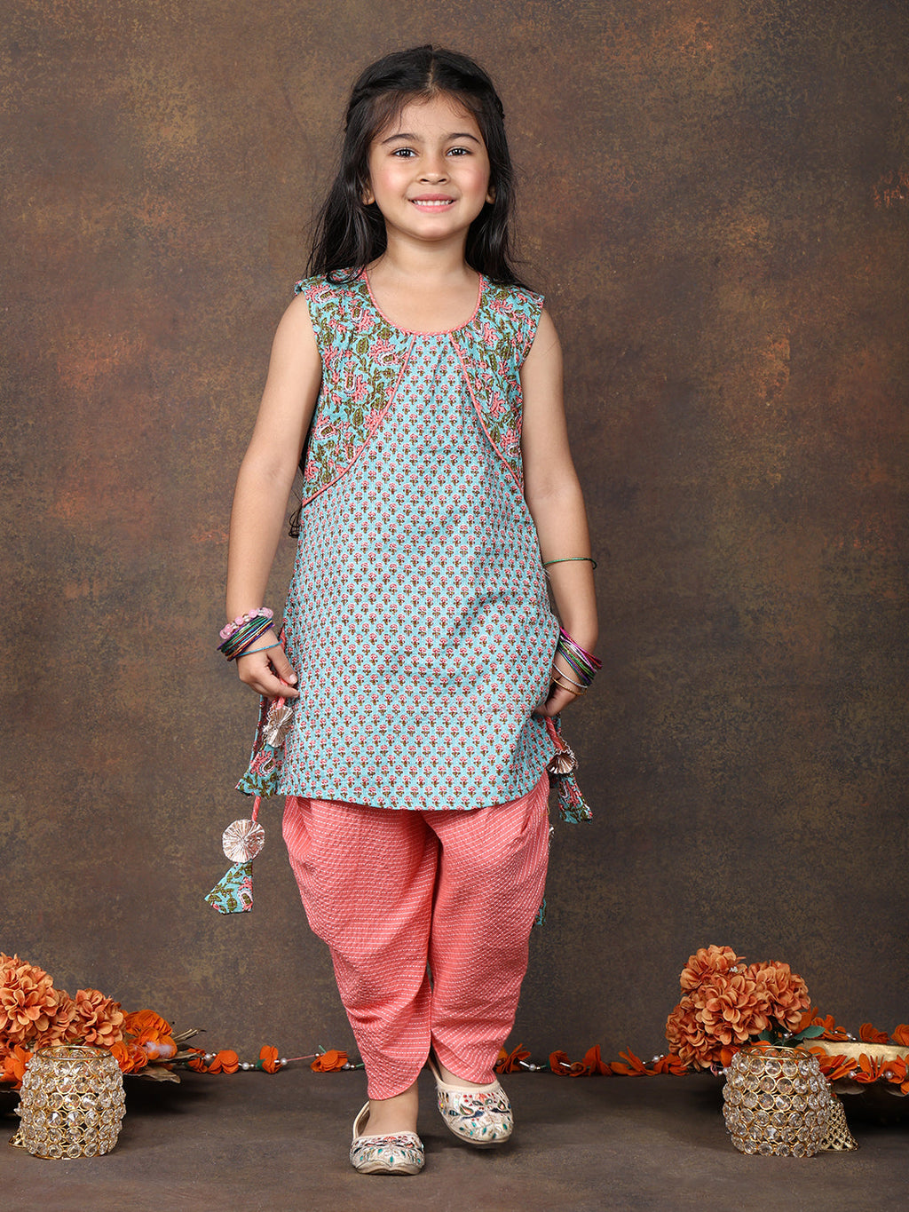 Blue Floral Printed sleeveless Kurti  paired with peach Dhoti