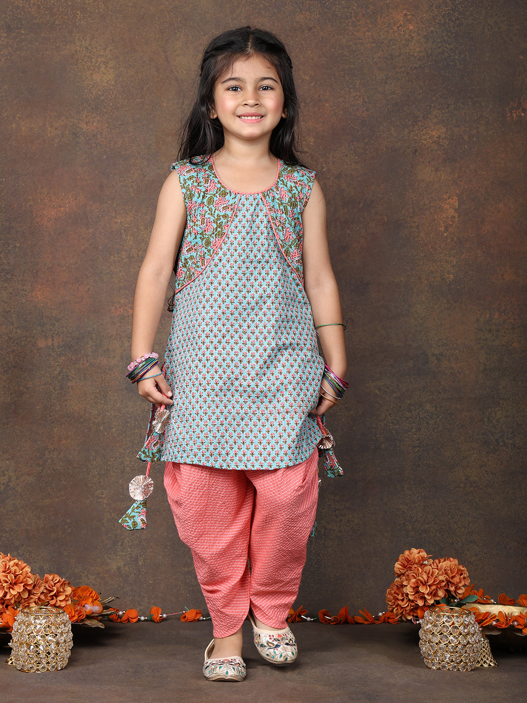 Blue Floral Printed sleeveless Kurti  paired with peach Dhoti