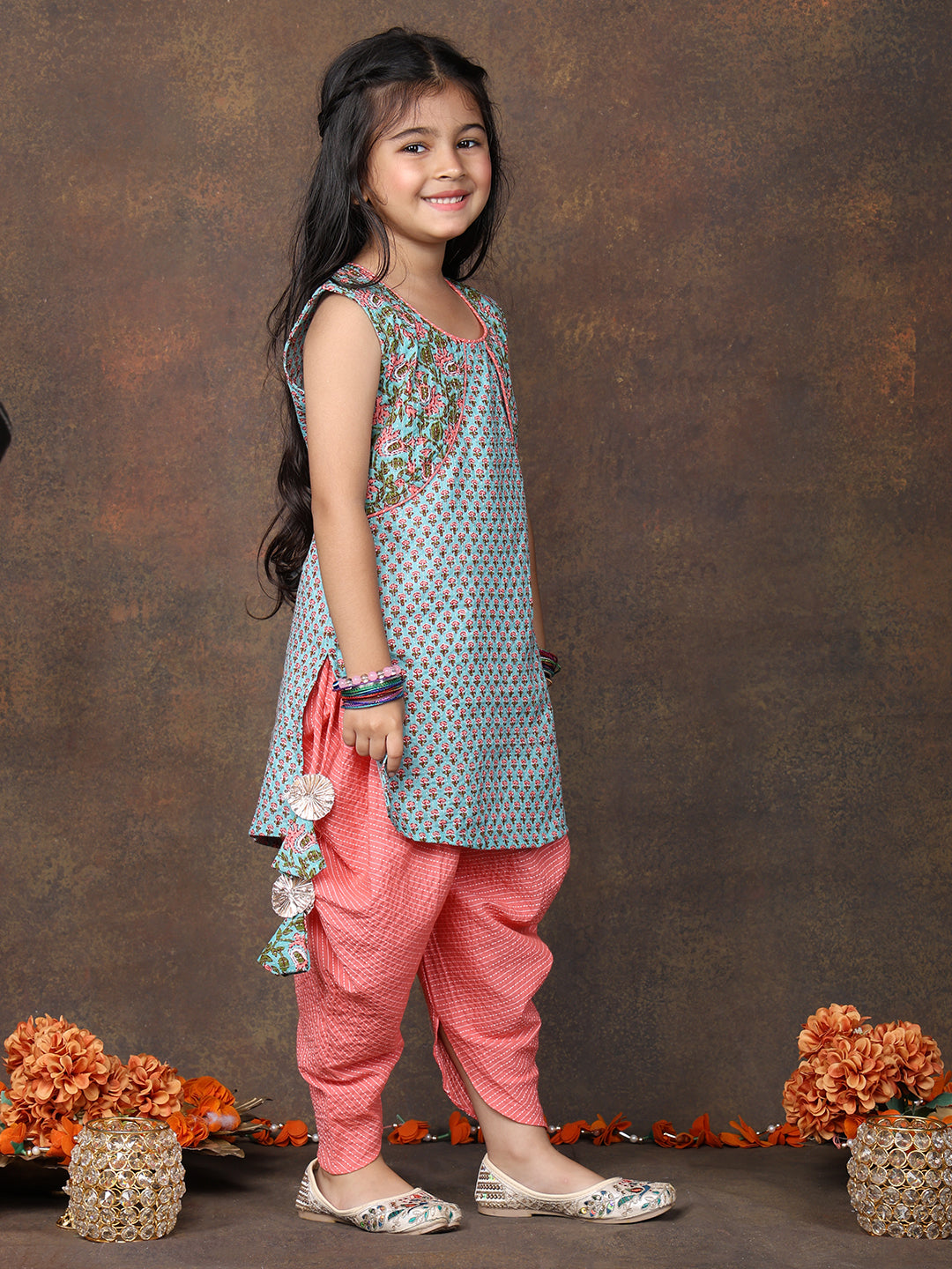 Blue Floral Printed sleeveless Kurti  paired with peach Dhoti