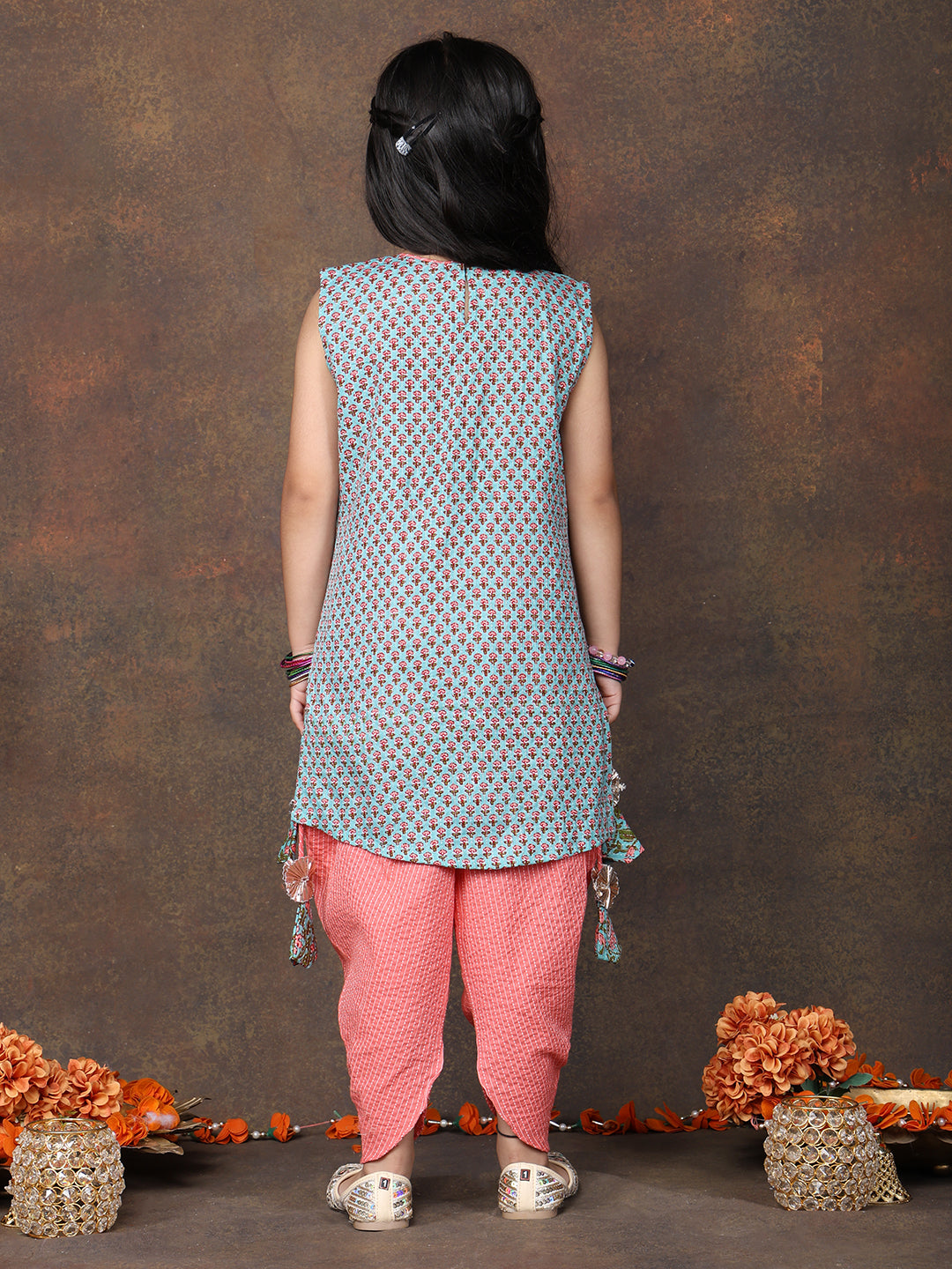 Blue Floral Printed sleeveless Kurti  paired with peach Dhoti