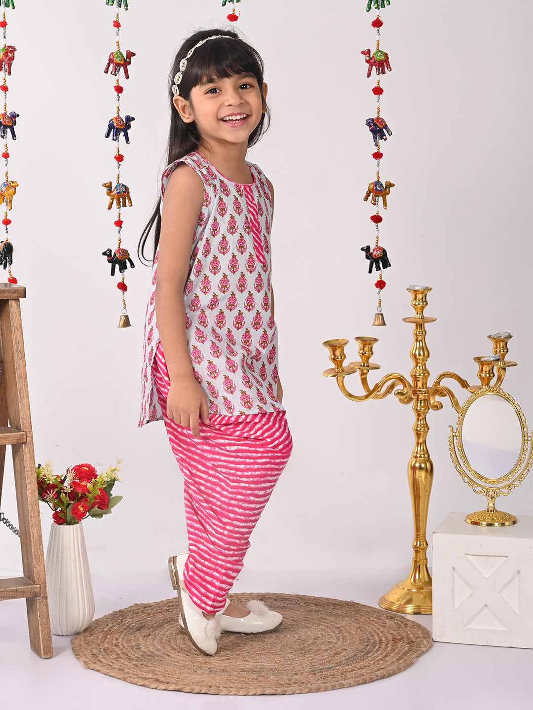 Pink printed Kurti with pink lehriya dhoti