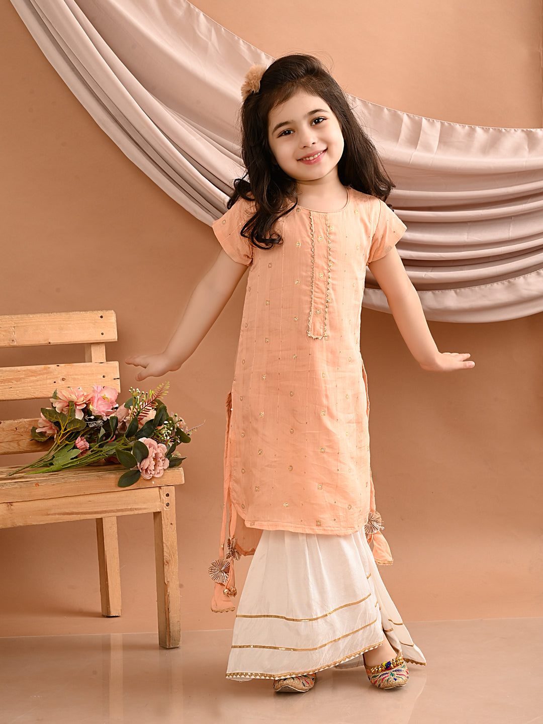 Peach gold embroidered kurti with white sharara