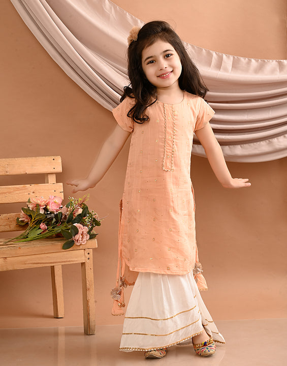 Peach gold embroidered kurti with white sharara