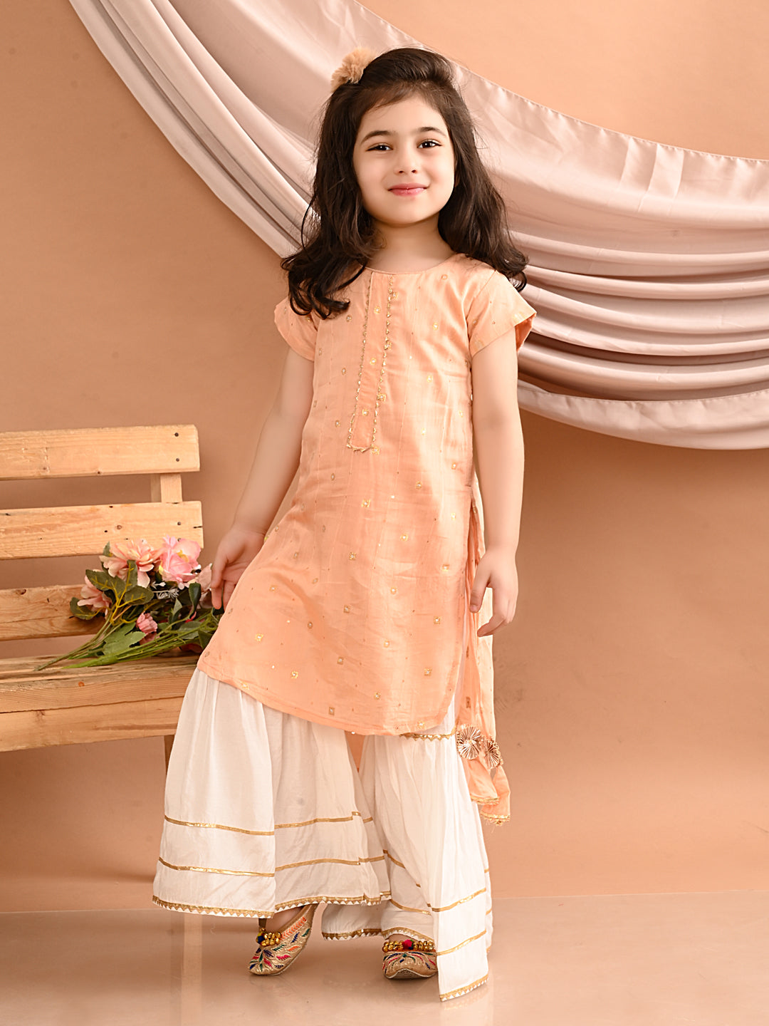 Peach gold embroidered kurti with white sharara