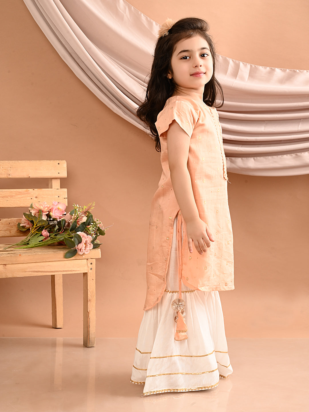 Peach gold embroidered kurti with white sharara