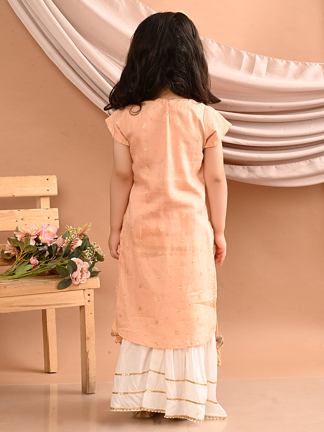 Peach gold embroidered kurti with white sharara