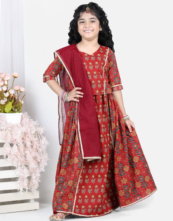 Red motif printed lace embellished top with lehenga and dupatta