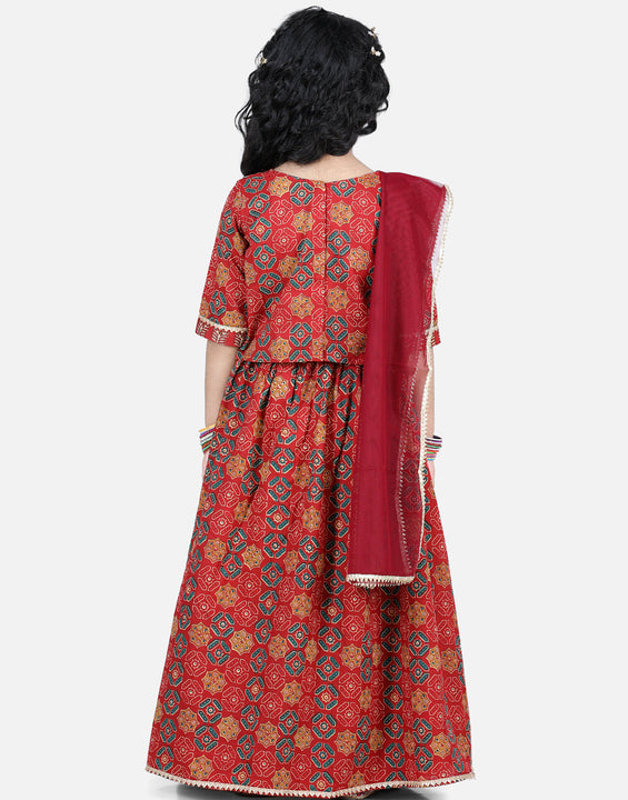 Red motif printed lace embellished top with lehenga and dupatta
