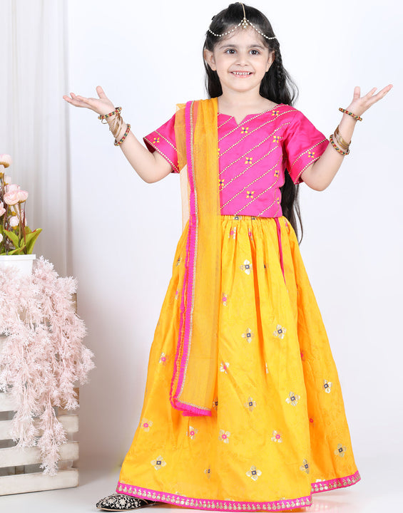 Pink brocade top with yellow lehenga and dupatta
